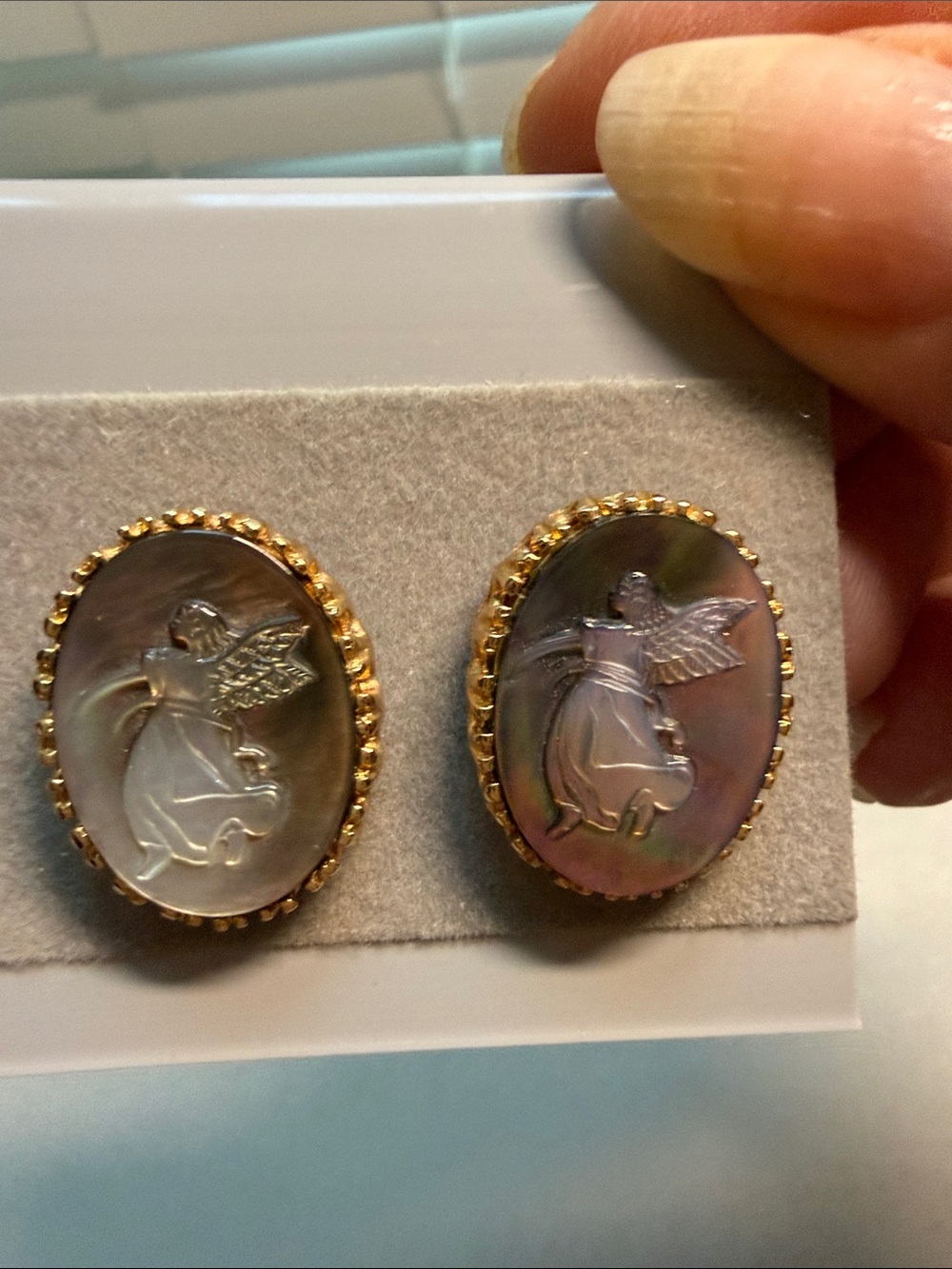 Vintage carved abalone guardian angel earrings
